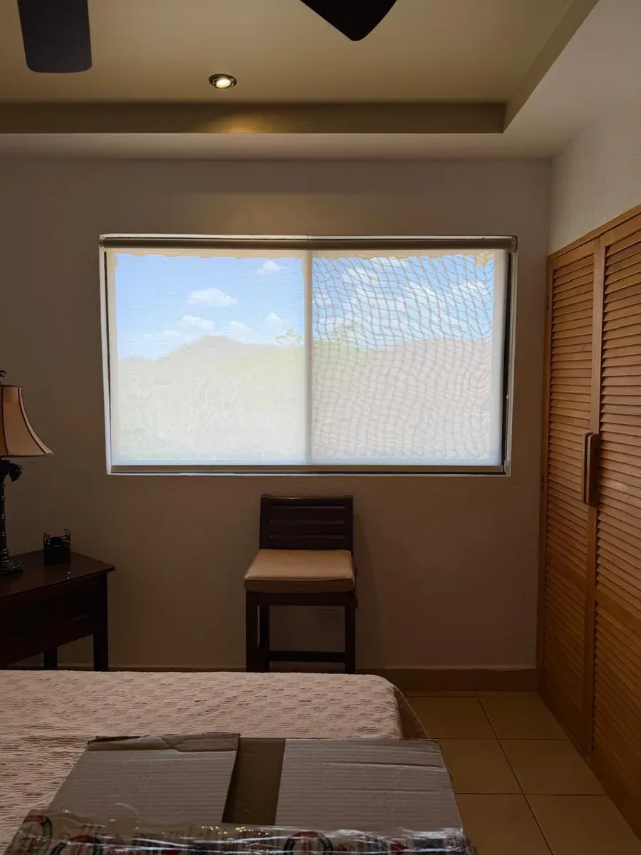 Persiana screen en recámara con vista al paisaje · Costa Rica
